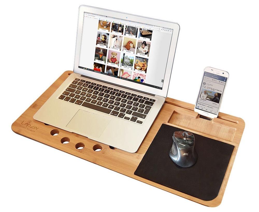 木头床上的笔记本电脑垫+手机支架